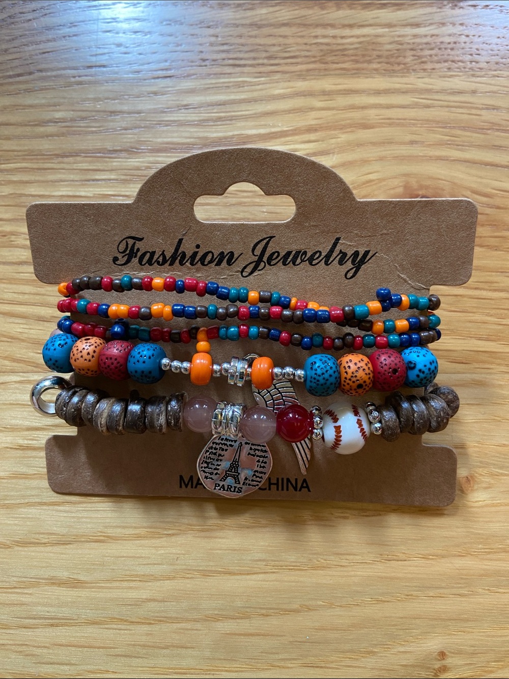 Set of 5 stretchy beaded bracelets with charms